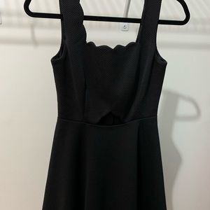 Scallop neck line Black Dress. NWT
